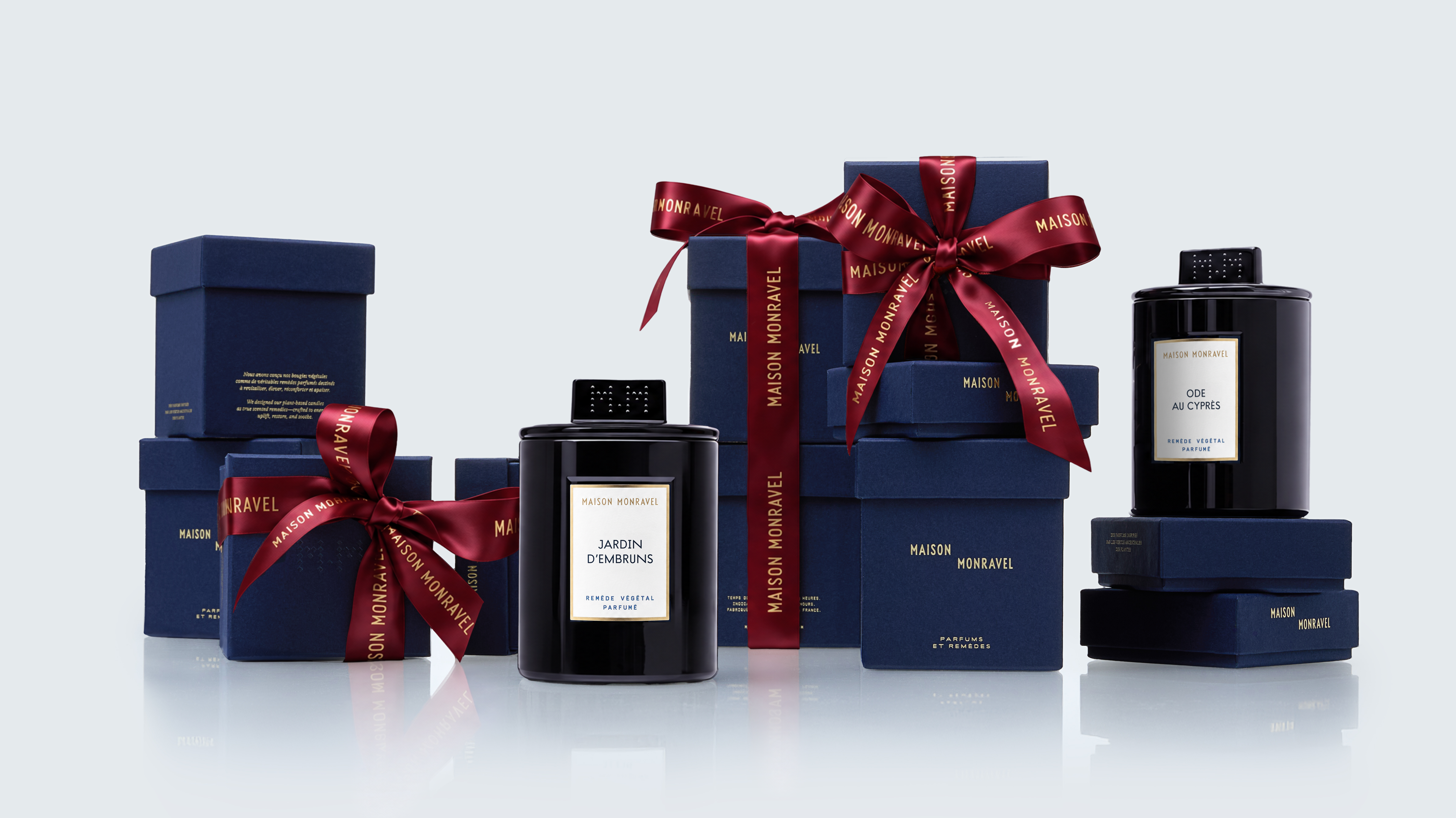 Maison Monravel indigo blue gift boxes tied with a madder-red ribbon